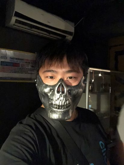 Xia in a scorpion mask